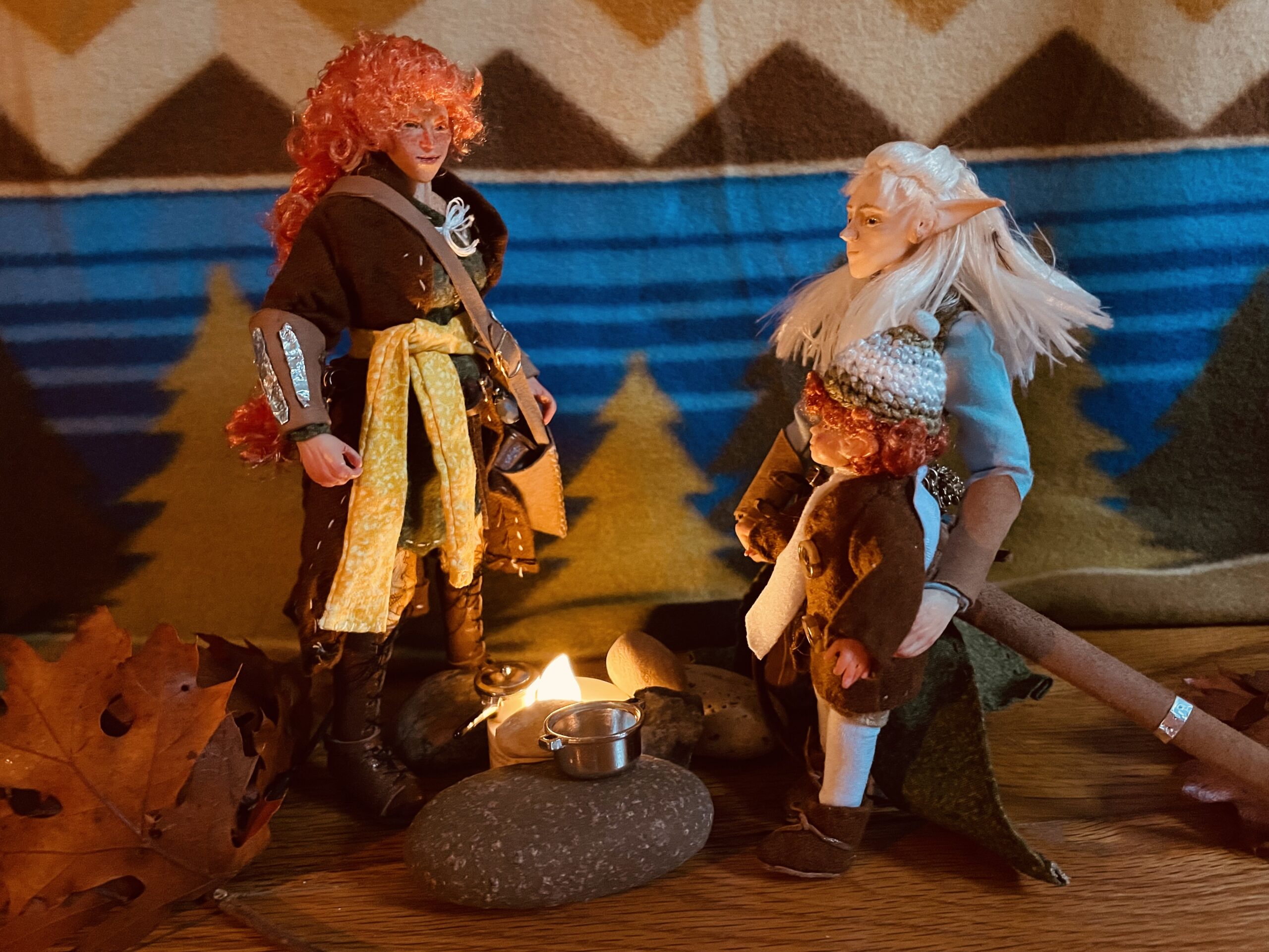 Dolls by a fireplace